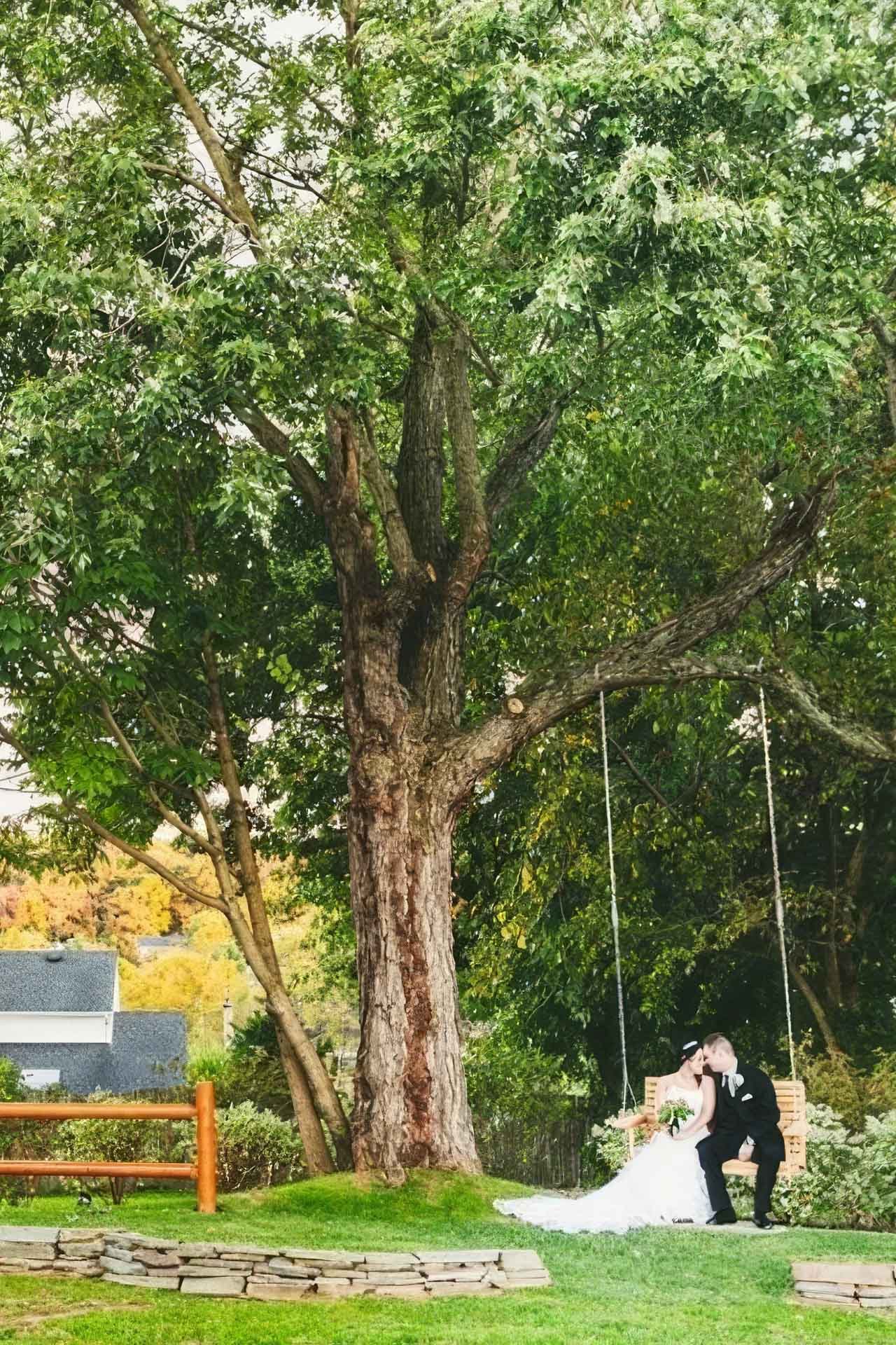 warrington country club wedding photo bride on swing